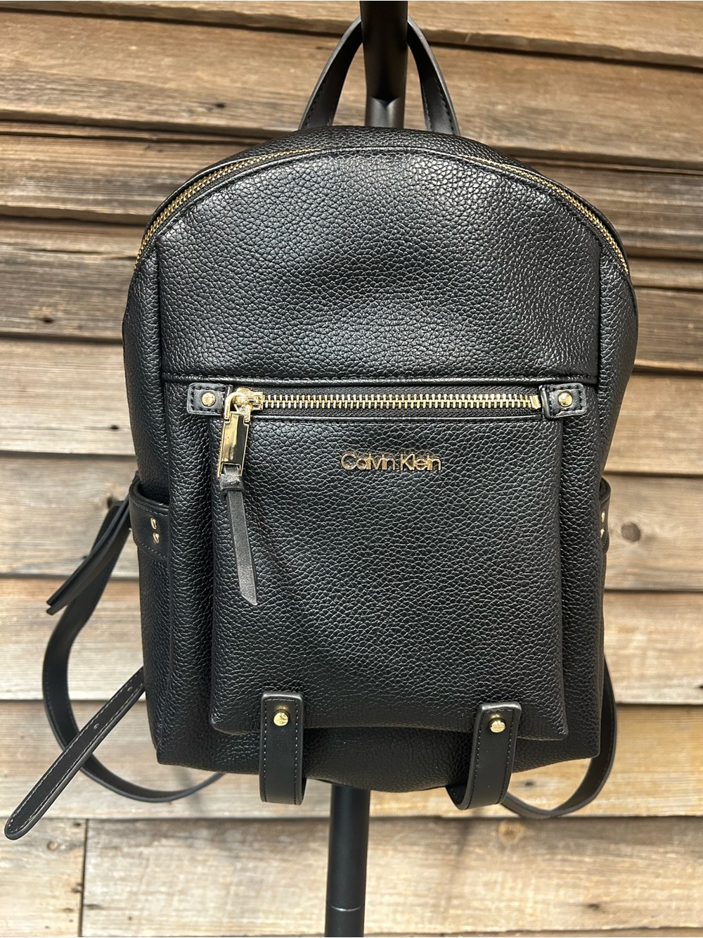 Calvin Klein Black Pebbled Leather Mini Backpack with Gold Hardware